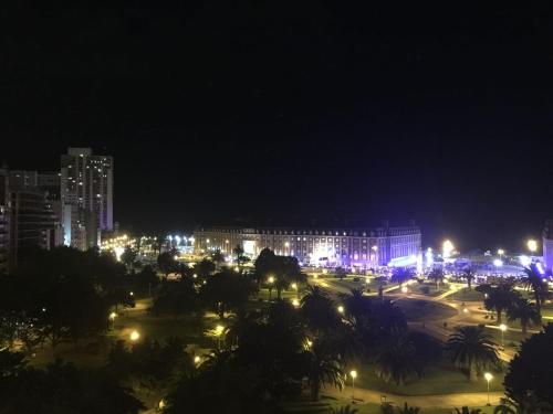 a city lit up at night with lights at Departamento Plaza Colón, Mar del Plata in Mar del Plata