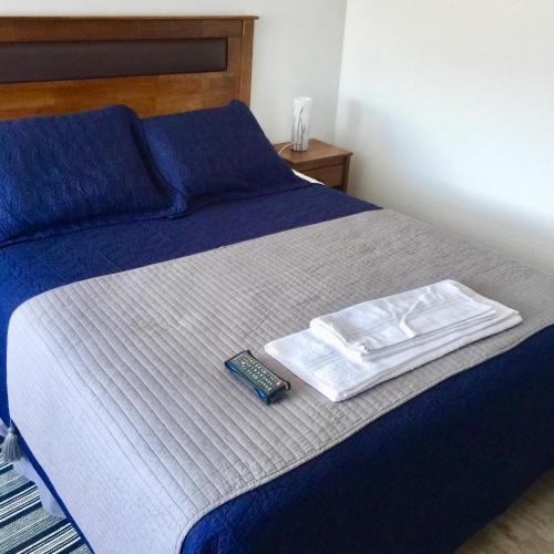 Postel nebo postele na pokoji v ubytování El Camino Hotel