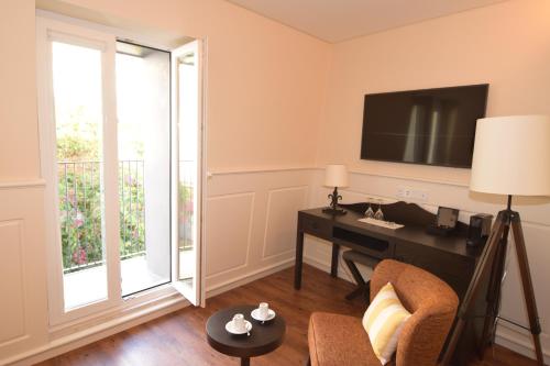 Televisyen dan/atau pusat hiburan di Lisbon Wine Hotel