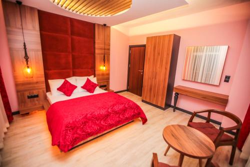 Кровать или кровати в номере Borapark Otel