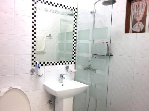 Ванная комната в Mayfair Deneb Pension