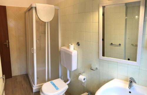 a bathroom with a toilet and a sink at B&B Pontepiccolo in Catanzaro