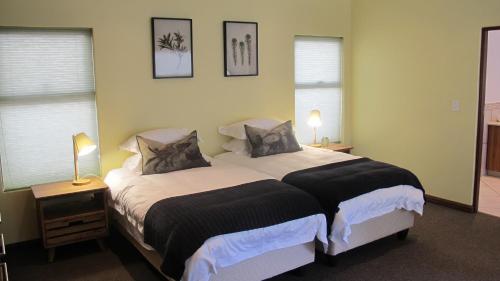 En eller flere senge i et værelse på 397 Vaal de Grace Golf Estate