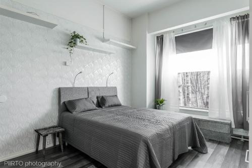 Ένα ή περισσότερα κρεβάτια σε δωμάτιο στο Hungerborg City Home