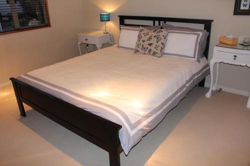 Кровать или кровати в номере Amberwood