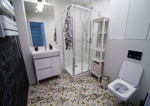Vonios kambarys apgyvendinimo įstaigoje Apartament KRIS 412