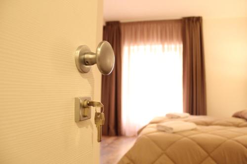 B&B Erifrà Piccolo Hotelにあるベッド