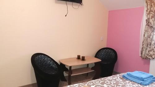Postel nebo postele na pokoji v ubytování Hotel