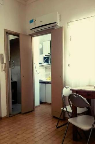 Η κουζίνα ή μικρή κουζίνα στο Departamento Fran