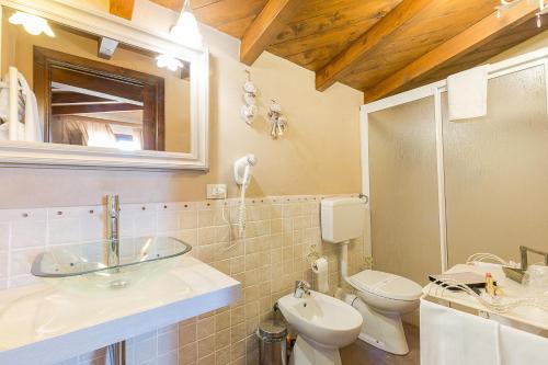 Kúpeľňa v ubytovaní Hotel Villa Calandrino