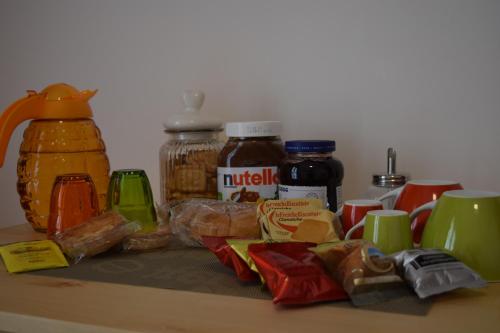 a counter top with various food items on it at suite the natural color in Selargius