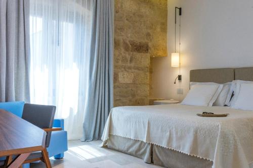 เตียงในห้องที่ Castello di Ugento