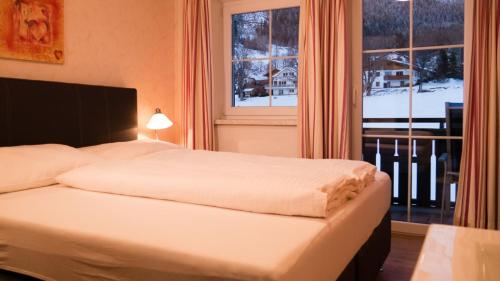 Postel nebo postele na pokoji v ubytování Appartement "Haus Lisa" in Ramsau am Dachstein