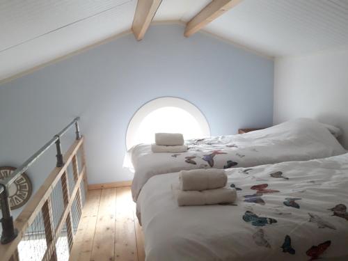 Cama o camas de una habitación en Vecht & Weide Weesp