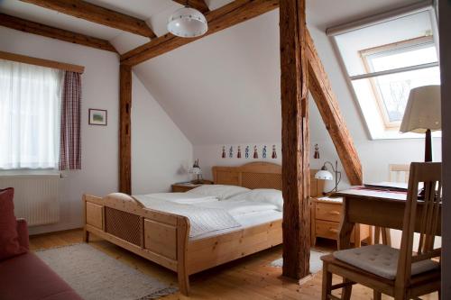 Postel nebo postele na pokoji v ubytování Weingut Tauss