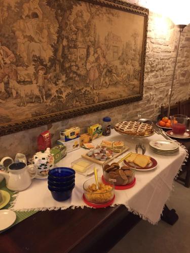 a table with food on top of it at Villa Perenich in Chieti