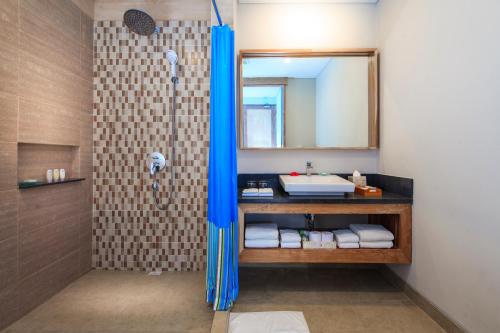 Koupelna v ubytování Mahagiri Resort Nusa Lembongan