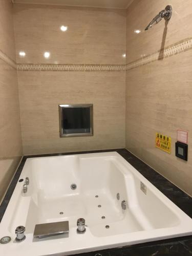 Kylpyhuone majoituspaikassa New Bale Motel