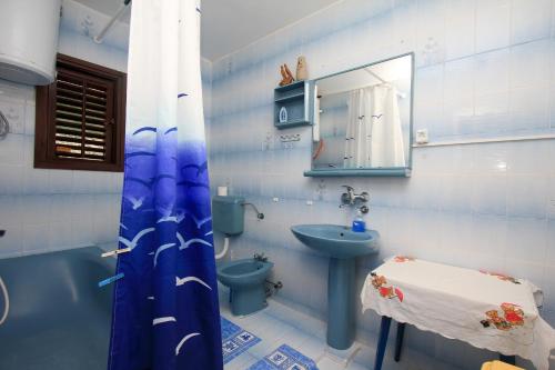 Ένα μπάνιο στο Apartment Lile