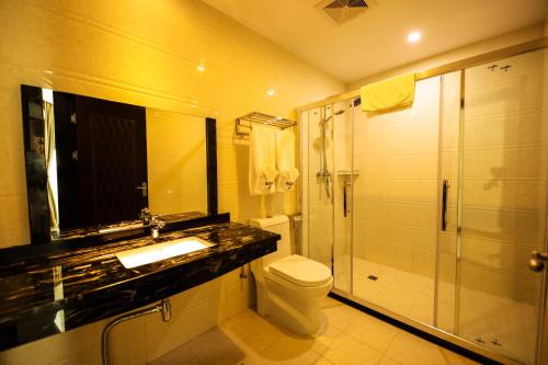 Kylpyhuone majoituspaikassa Jing Pin Hotel