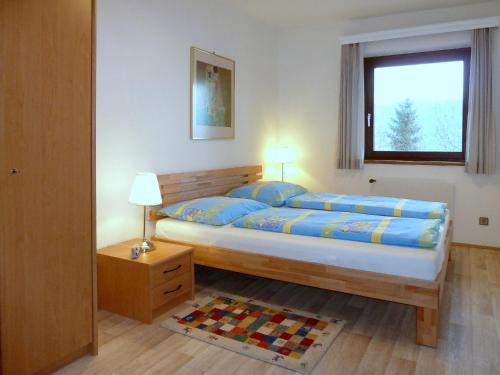Ferienwohnung Eichlerにあるベッド