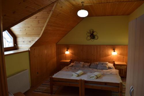 Кровать или кровати в номере Penzion Micik