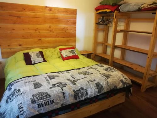 Кровать или кровати в номере Eco-Cabañas Quetroleufu