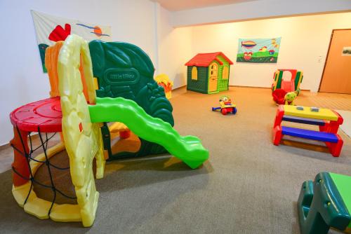 a room filled with lots of different types of toys at Karyatis Resort in Synikia Mesi Trikalon