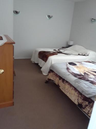 Postel nebo postele na pokoji v ubytování Mountain View Motel