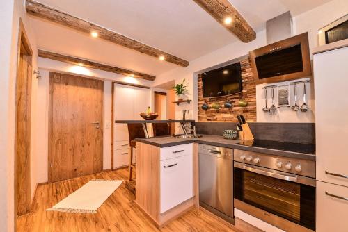 Köök või kööginurk majutusasutuses Sonn Alpin - Ferienwohnungen