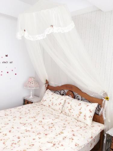Katil atau katil-katil dalam bilik di Country Style Anping Homestay