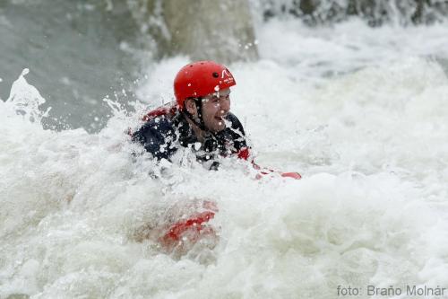 a man in a raft in the rapids of a river at Hotel and Park Divoká Voda in Bratislava