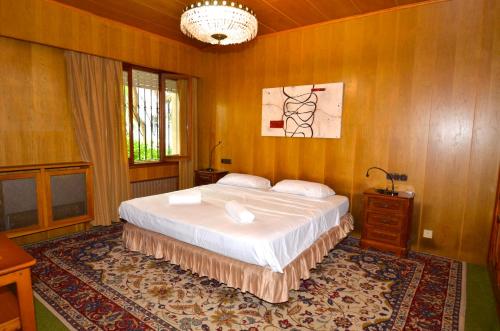 Ένα ή περισσότερα κρεβάτια σε δωμάτιο στο Villa Son Armadans