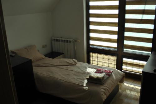 Ένα ή περισσότερα κρεβάτια σε δωμάτιο στο TOP CENTER , MODERN AND QUIET APARTMENT