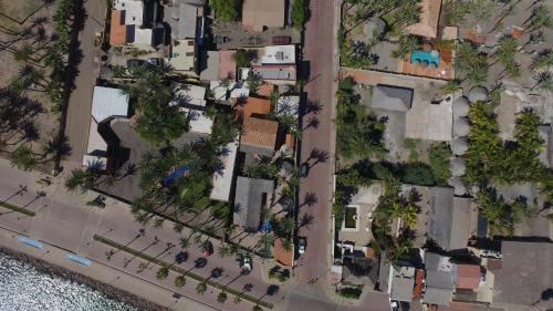 an overhead view of a city with houses and trees at Sukasa Bungalows in Loreto