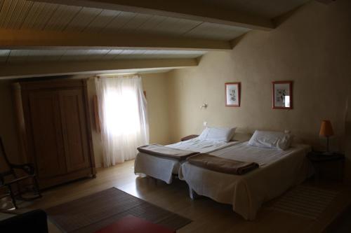 Кровать или кровати в номере La Cantarera