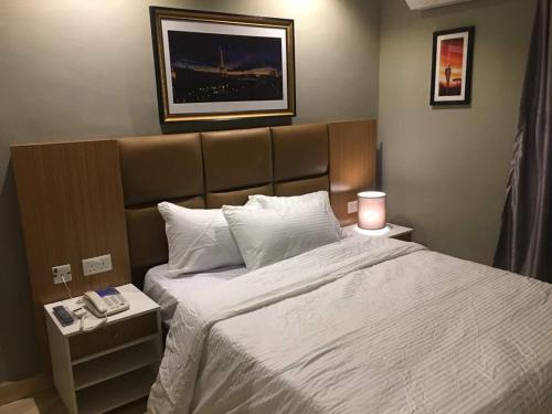 Cama ou camas em um quarto em Blackwood Hotels