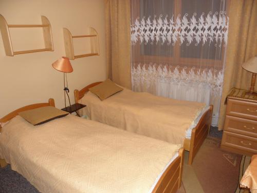 Posteľ alebo postele v izbe v ubytovaní willa Relaks