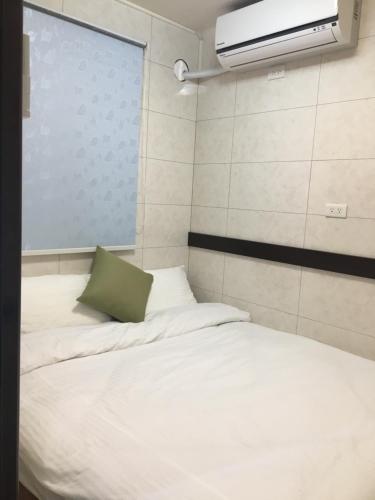 Cama o camas de una habitación en 阿鑫民宿