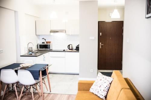 Η κουζίνα ή μικρή κουζίνα στο Apartamenty Opal