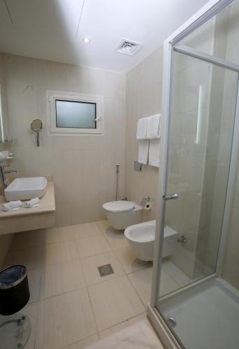 Vannas istaba naktsmītnē Rawda Hotel