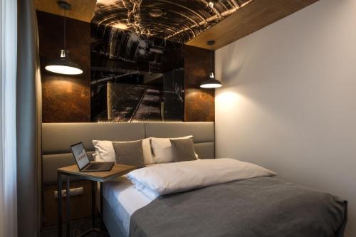 Säng eller sängar i ett rum på Hotel Esplanade Dortmund