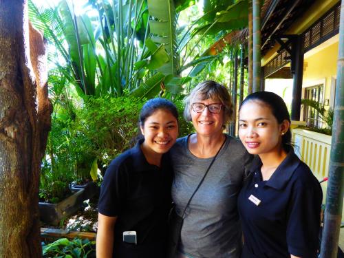 two women and an older woman posing for a picture at Residence Indochine D'angkor in Siem Reap