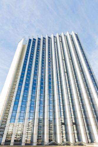 a tall building with a lot of windows at Congress Hotel Chemnitz in Chemnitz