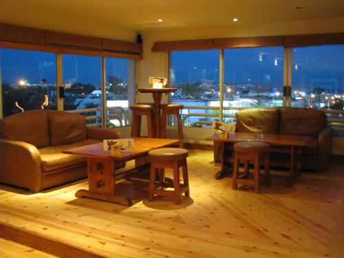 a living room with a couch and a table at Naama Blue Hotel in Sharm El Sheikh
