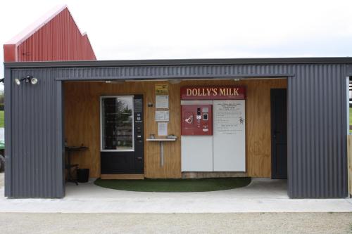 a building with a door and a sign on it at Barberry Hill in Stratford