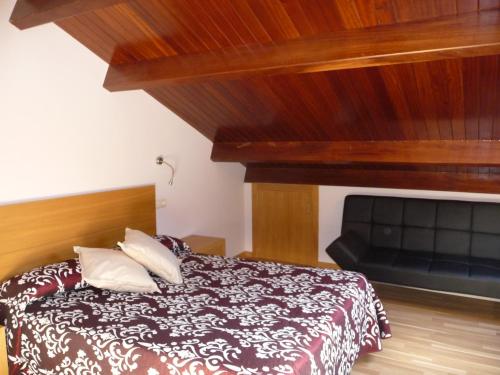 Postel nebo postele na pokoji v ubytování Hortas P.R.