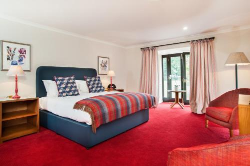 Säng eller sängar i ett rum på Parkway Hotel & Spa