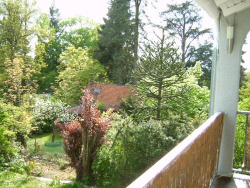 a view of a garden from the balcony of a house at Ferienwohnung Schlossblick in Bensheim