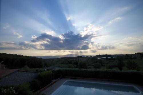 a view of a swimming pool from a house at Casa Rondini in Montegabbione